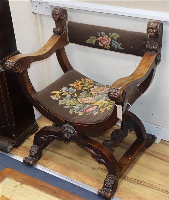 An Italian walnut X frame chair